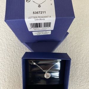 Swarovski Crystals Disc with initial Pendant A on a chain.NEW.